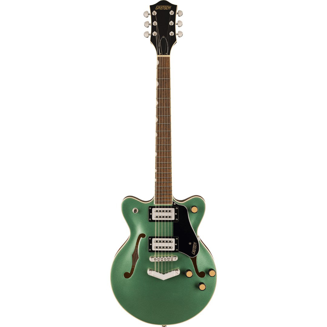 Green electric guitar on a white background