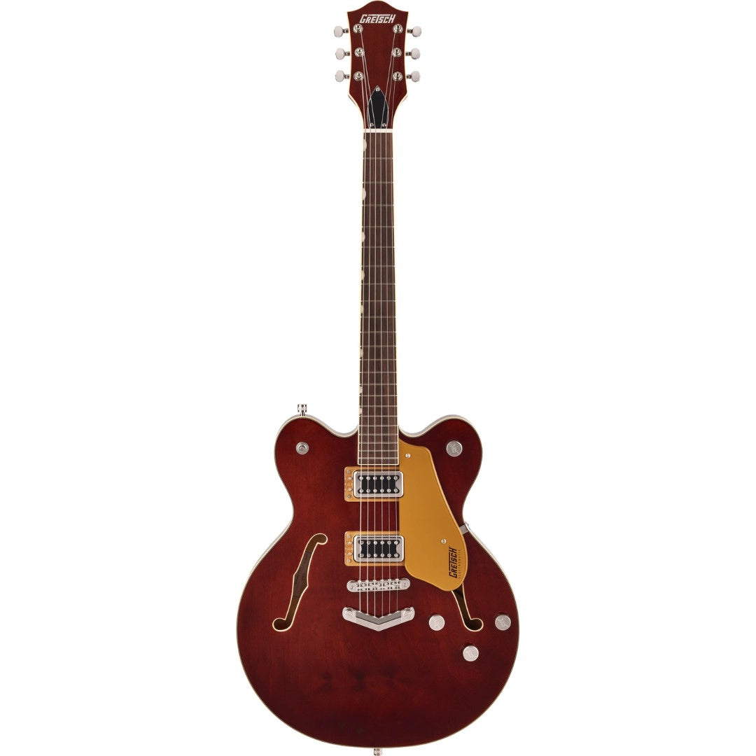 Red electric guitar on a white background