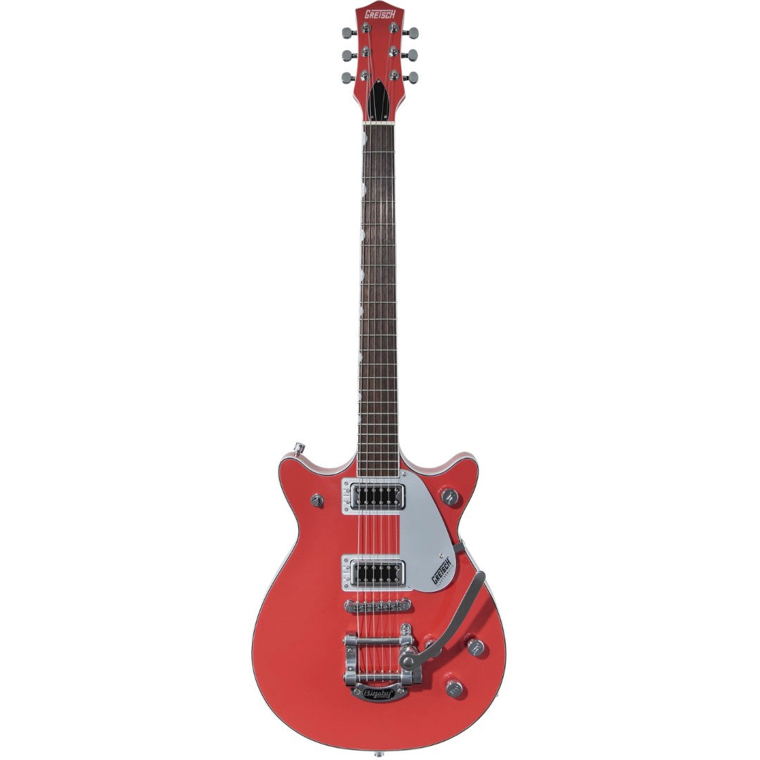 Red electric guitar on a white background