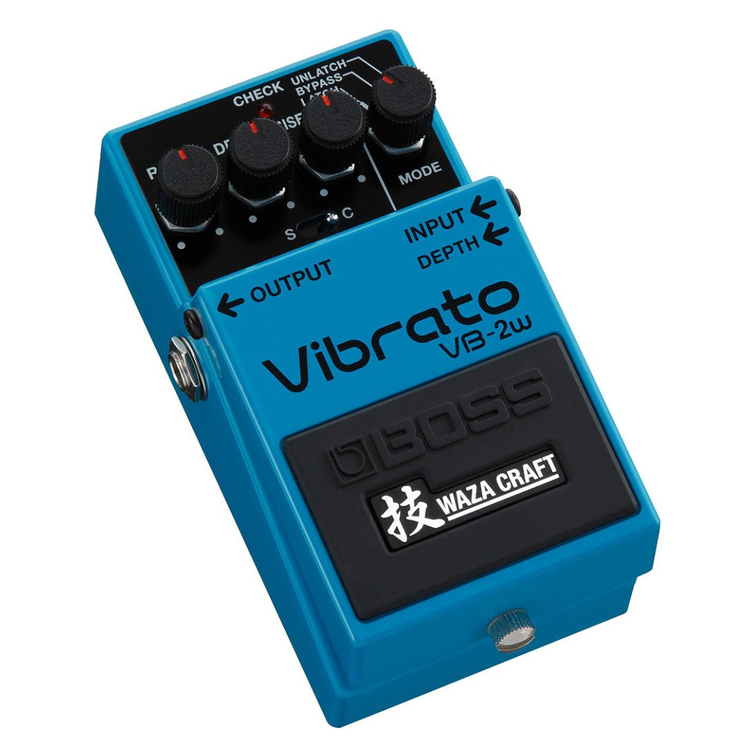 Blue Boss Waza Craft vibrato effects pedal on a white background
